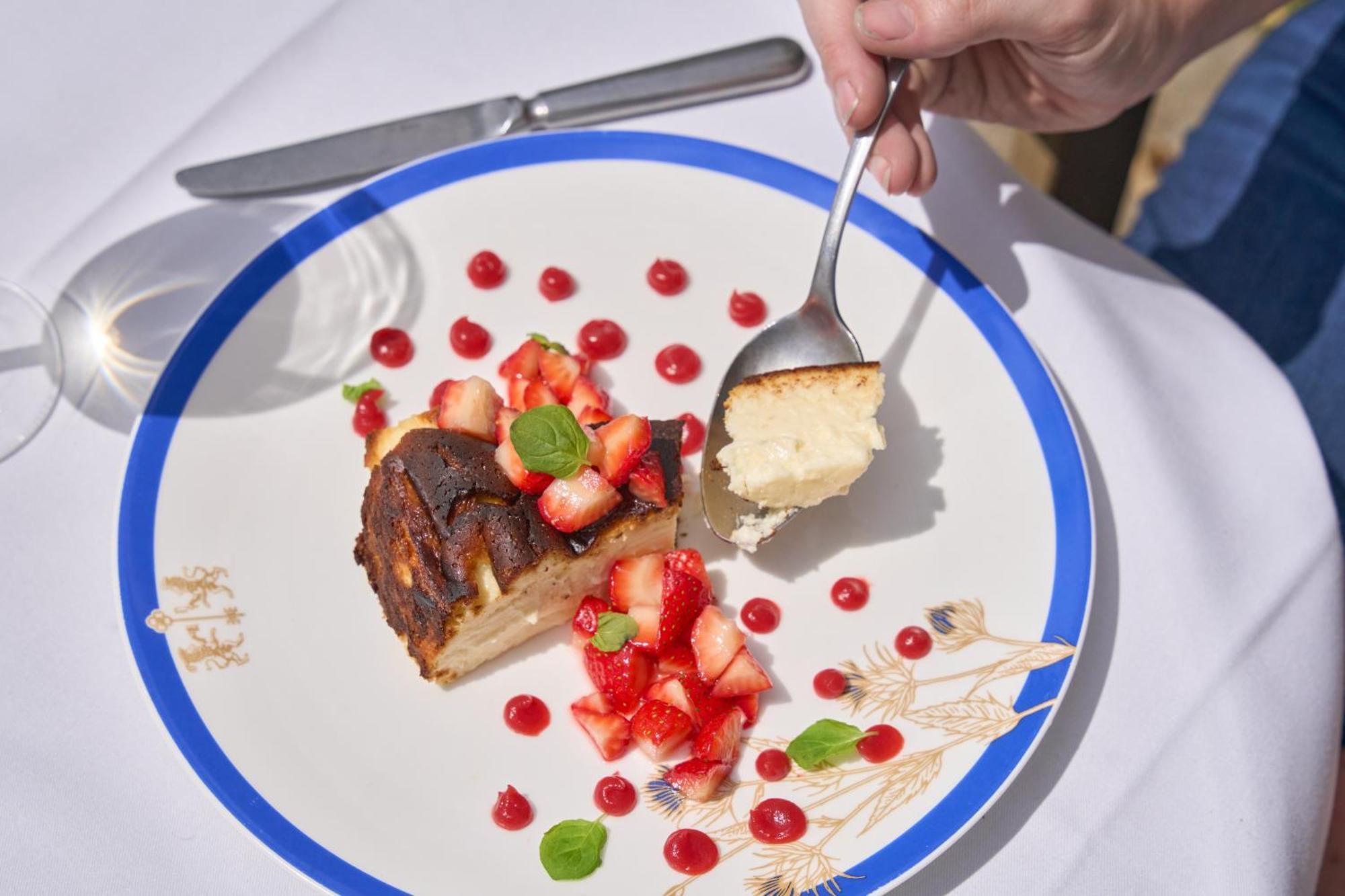 The Mitre, Hampton Court Hotel Kingston upon Thames  Exterior photo A person eating a dessert with a spoon